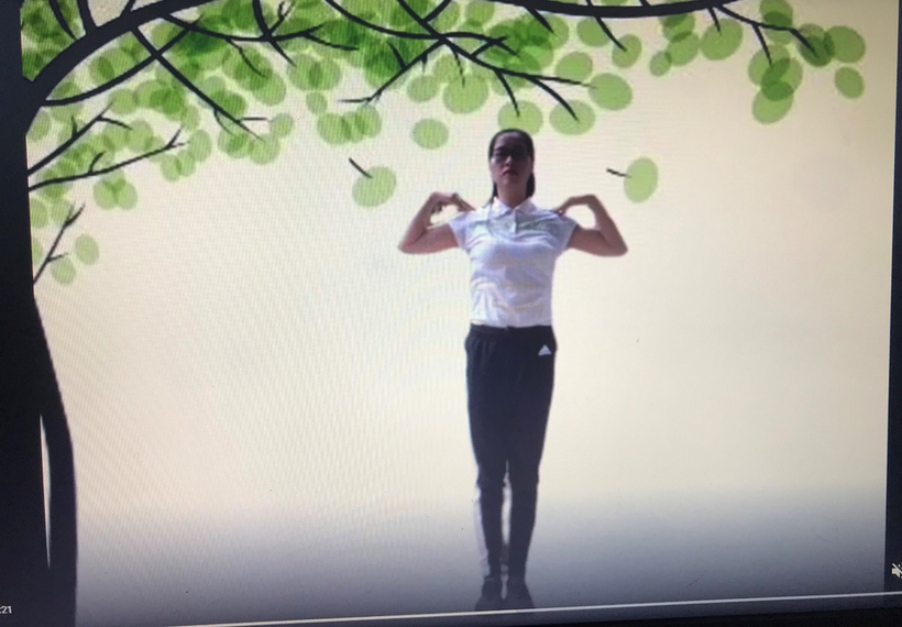 A person standing under a tree

Description automatically generated with medium confidence