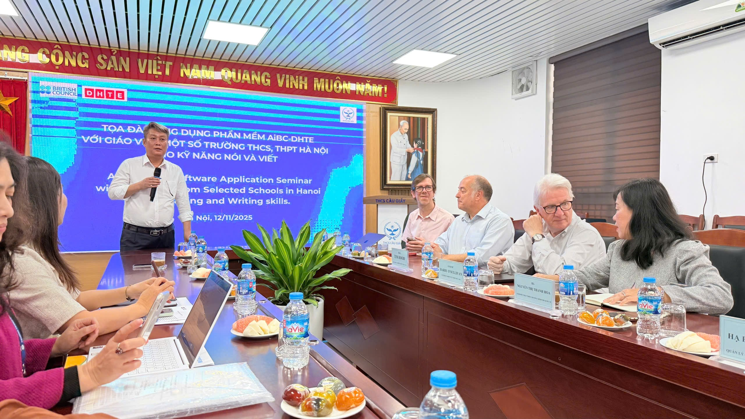 A group of people sitting at a table

Description automatically generated