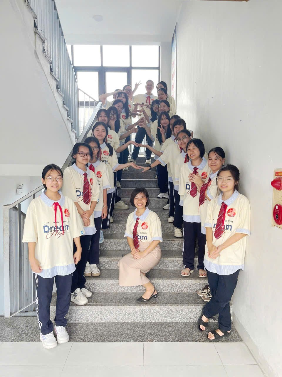 A group of people posing for a photo

AI-generated content may be incorrect.