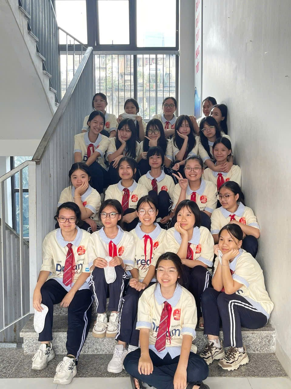 A group of people posing for a photo

AI-generated content may be incorrect.