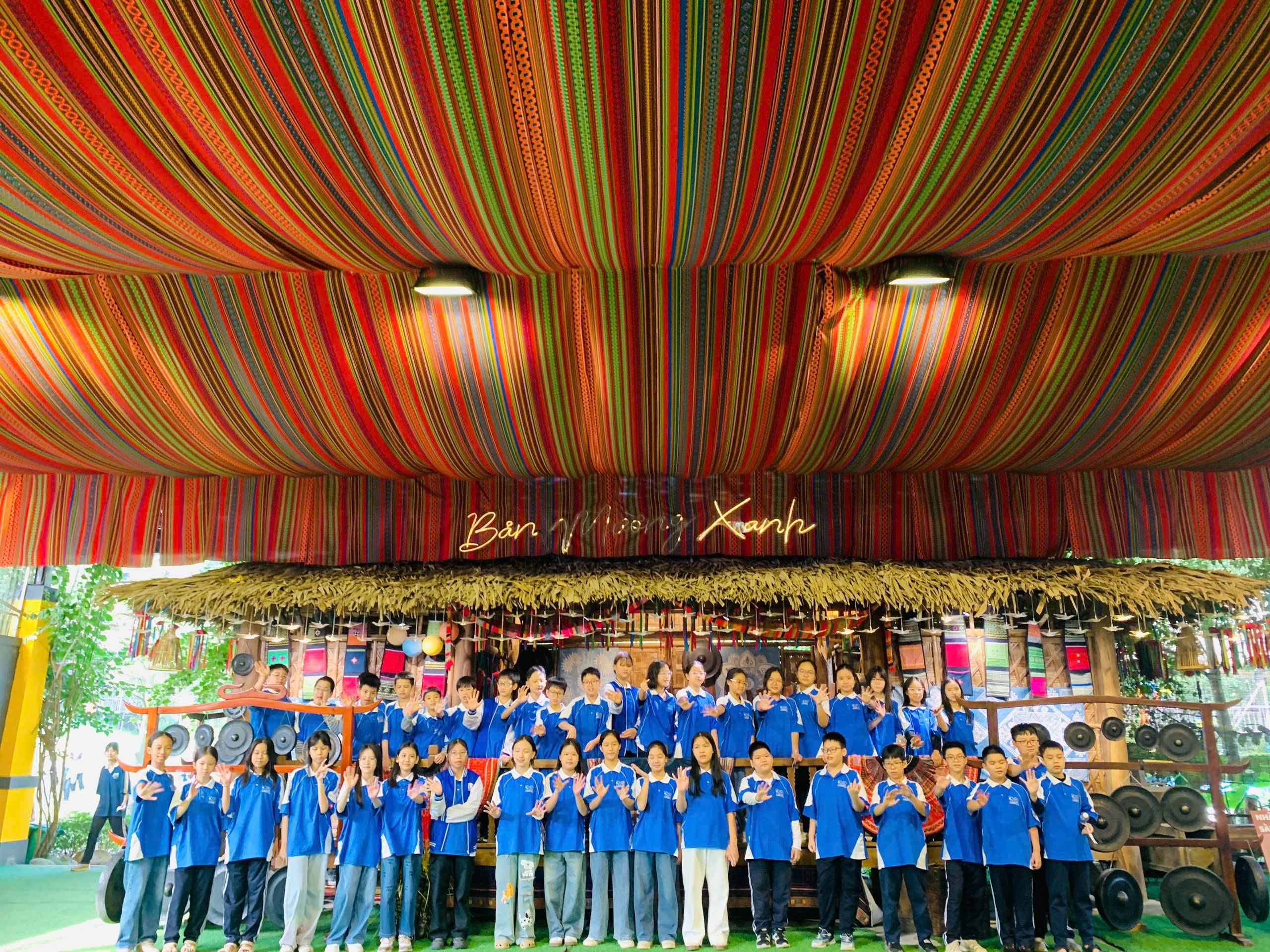 A group of people in blue shirts