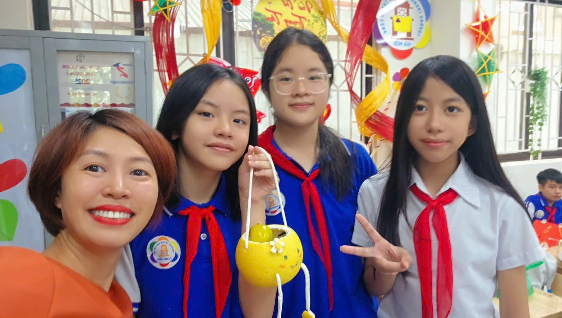 A group of girls posing for a photo
Description automatically generated