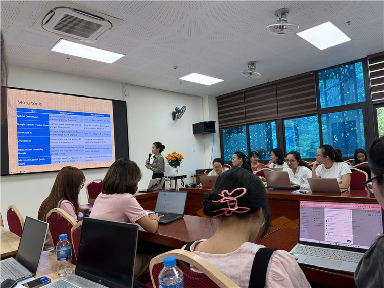 A group of people in a room with laptops

Description automatically generated