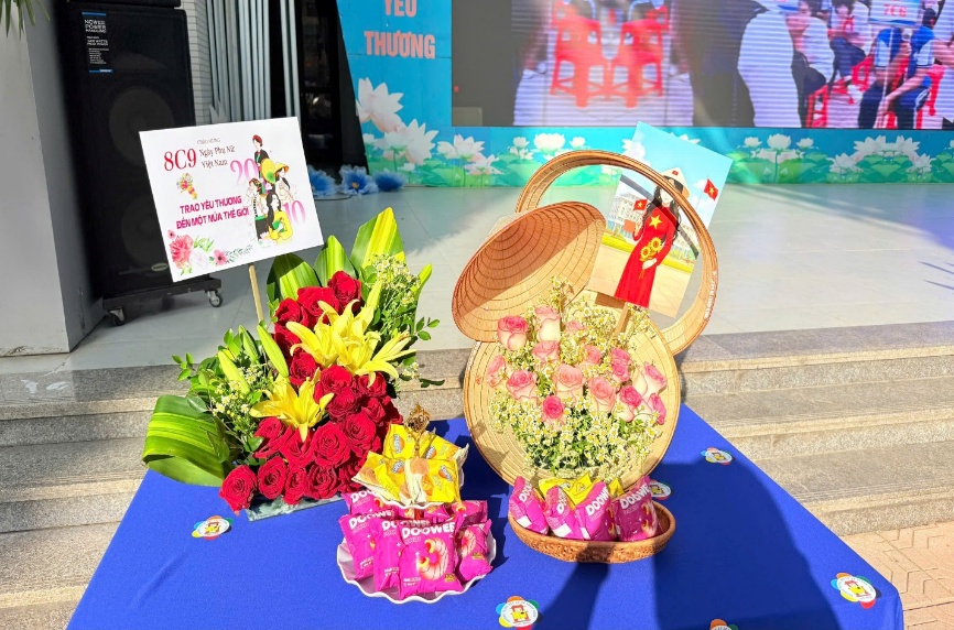 A basket of flowers and other items on a table

Description automatically generated