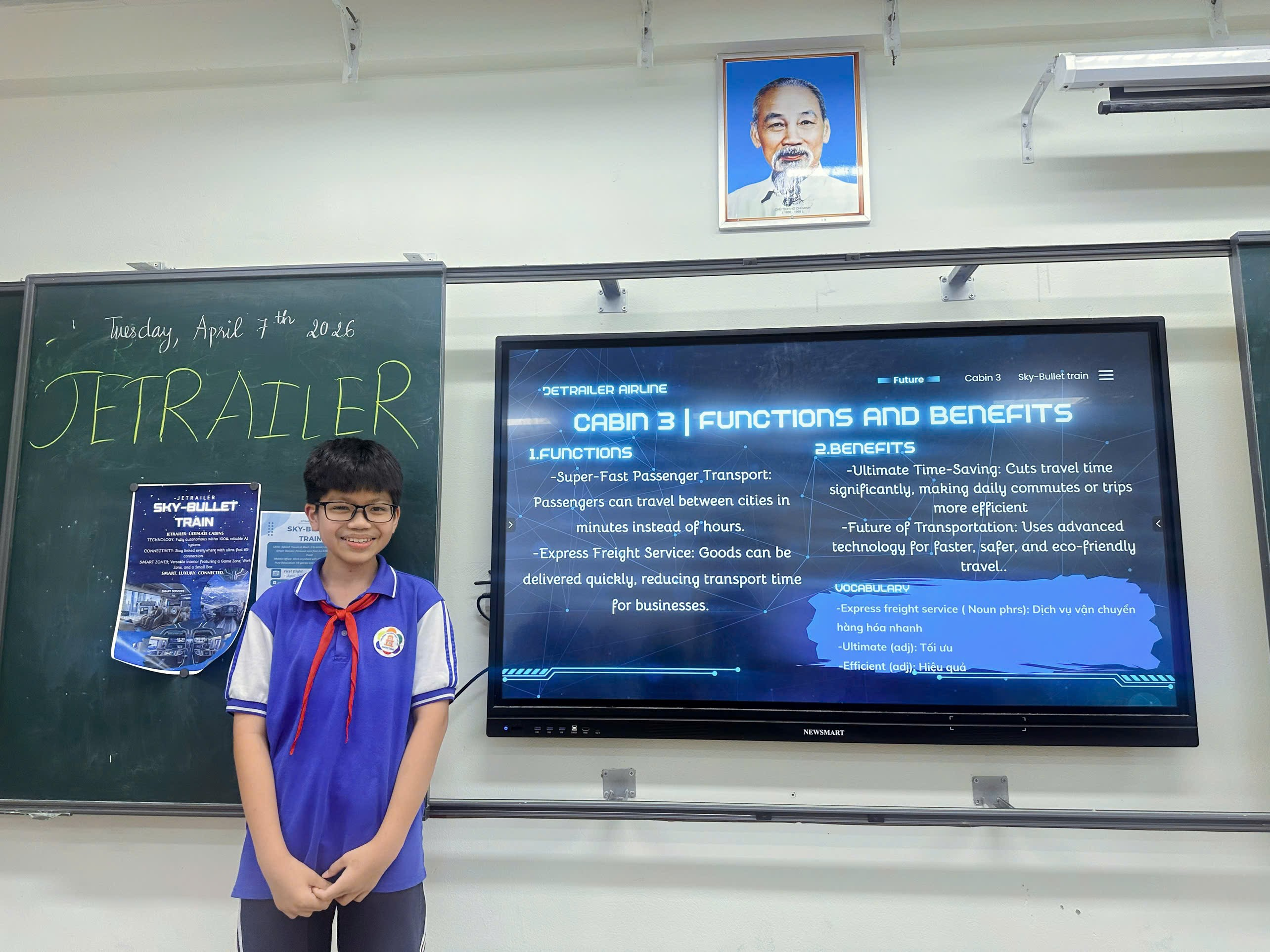 A child standing in front of a blackboard
Description automatically generated