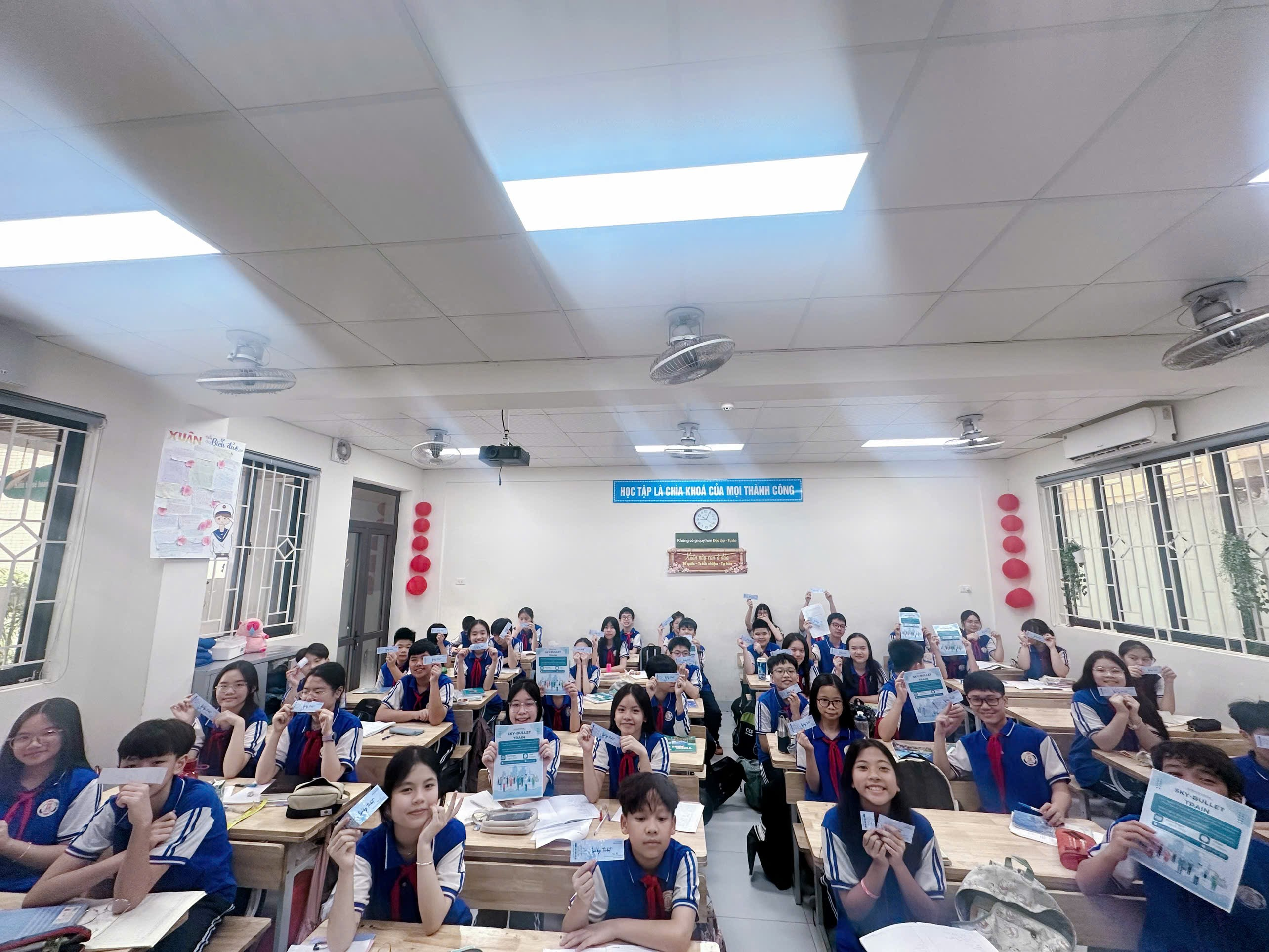 A group of students in a classroom
Description automatically generated